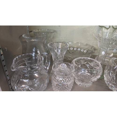 375 - A large lot of glassware to include Waterford Lismore red wine glass, Waterford teddy bear, a select... 