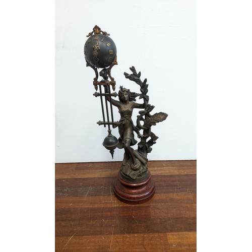 430 - A late 19th century spelter mystery clock Location: 3.1
If there is no condition report shown, pleas... 