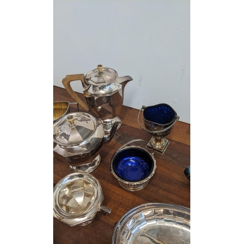 435 - A mixed lot of silver plate to include a matching tea service and other items Location: RAM
If there... 