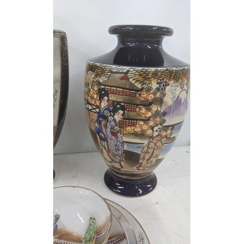 544 - A pair of 20th century Satsuma vases 30cm h A/F, together with one other vase along with a part Japa... 