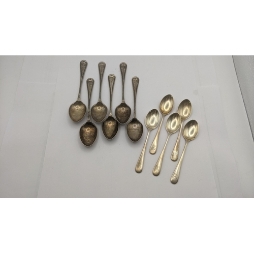 18 - Two sets of silver tea spoons both engraved with the letter 'K' to the terminals one set hallmarked ... 