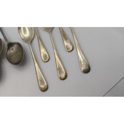 18 - Two sets of silver tea spoons both engraved with the letter 'K' to the terminals one set hallmarked ... 