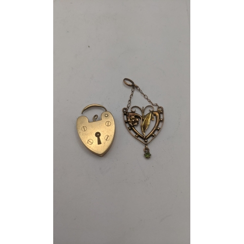 24 - A 9ct yellow gold heart shaped padlock clasp pendant, 3.2g, together with a 9ct yellow gold Art Nouv... 