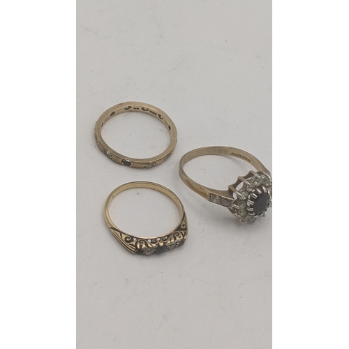 37 - Three gold ladies rings to include an 18ct yellow gold, diamond and blue sapphire ring A/F, 2g, toge... 