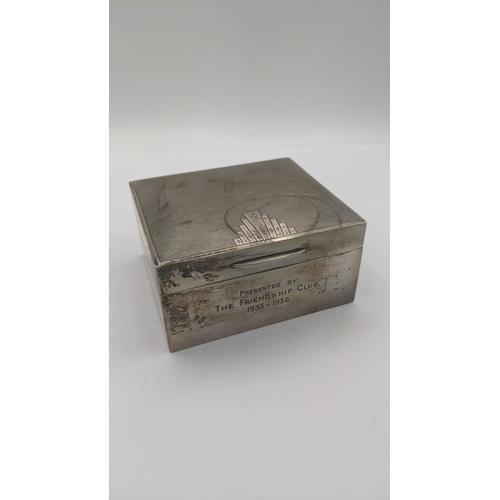 6 - Silver to include an engine turned cigarette box hallmarked London 1935, with the jubilee mark along... 