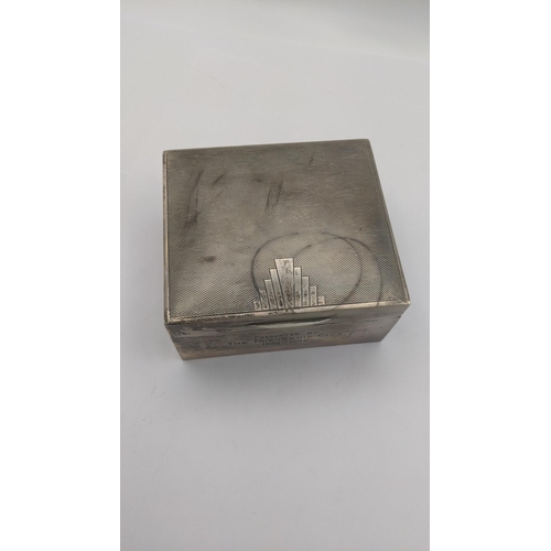 6 - Silver to include an engine turned cigarette box hallmarked London 1935, with the jubilee mark along... 