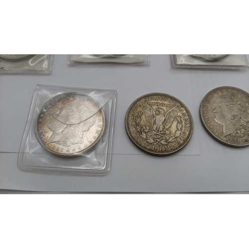 67 - A collection of American silver coinage to include 11 Morgan dollars dated 1878, 1921, 1883 and othe... 