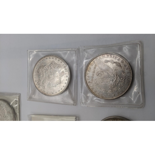 67 - A collection of American silver coinage to include 11 Morgan dollars dated 1878, 1921, 1883 and othe... 