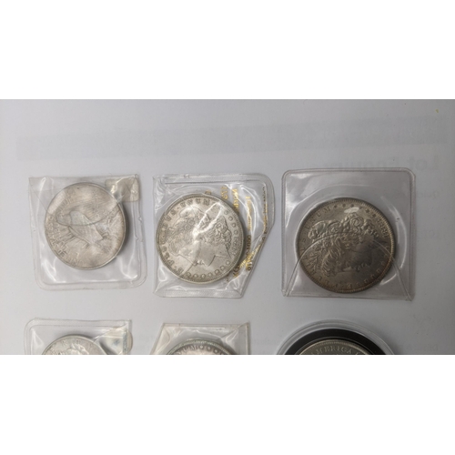 68 - A group of American silver coinage comprising 8 Morgan dollars, 1884, 1921, 1883 and others together... 