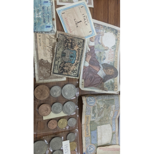 74 - A mixed lot of World coins and bank notes to include Victorian half crowns, Gothic florins and other... 