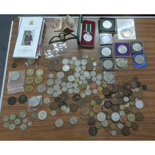 76 - A group of World coinage to include 1817 half crown, 1799 half penny, a small selection of pre 1947 ... 