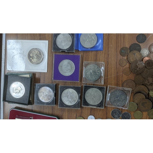 76 - A group of World coinage to include 1817 half crown, 1799 half penny, a small selection of pre 1947 ... 