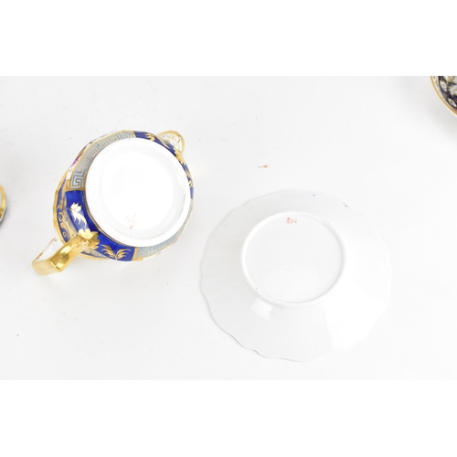 106 - A selection of 19th century porcelain tea ware to include a circa 1825 Ridgway creamer, two cups and... 