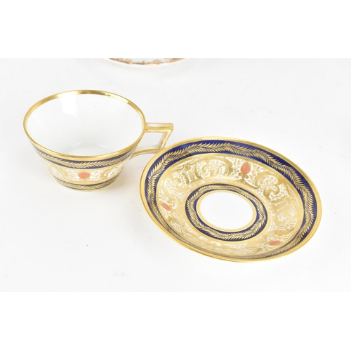 107 - A selection of mainly 19th century cups and saucers to include an early 19th century Derby cup and s... 