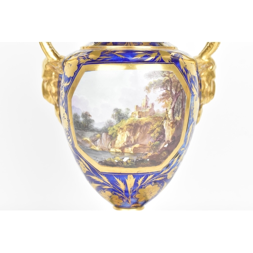 30A - An early 19th century Masons vase, circa 1815, of amphora shape with goat's-head handles, decorated ... 