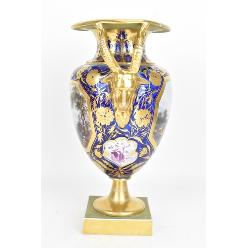 30A - An early 19th century Masons vase, circa 1815, of amphora shape with goat's-head handles, decorated ... 