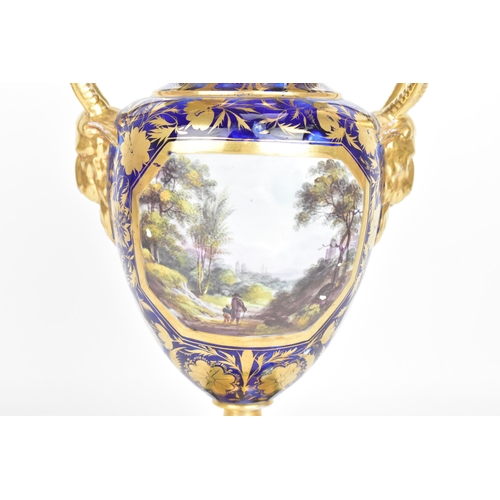 30A - An early 19th century Masons vase, circa 1815, of amphora shape with goat's-head handles, decorated ... 