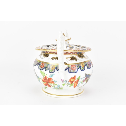 18 - An early 19th century Masons sucrier, circa 1820, with high 'frilly' ornate handles, bone china, wit... 