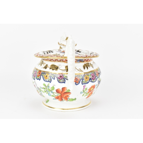 18 - An early 19th century Masons sucrier, circa 1820, with high 'frilly' ornate handles, bone china, wit... 