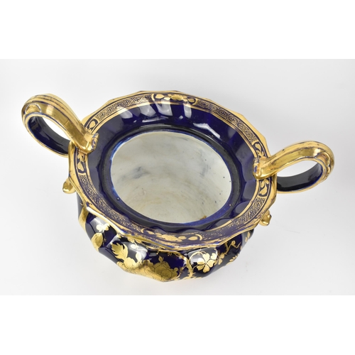 24 - An early 19th century Masons pot-pourri vase, circa 1820-25, with mazarine-blue ground, painted in a... 