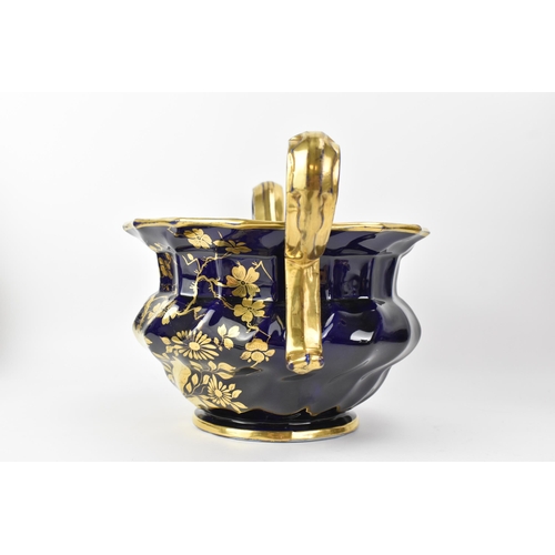 24 - An early 19th century Masons pot-pourri vase, circa 1820-25, with mazarine-blue ground, painted in a... 