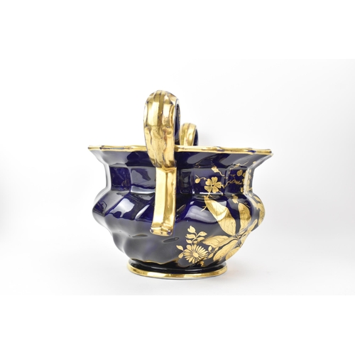 24 - An early 19th century Masons pot-pourri vase, circa 1820-25, with mazarine-blue ground, painted in a... 