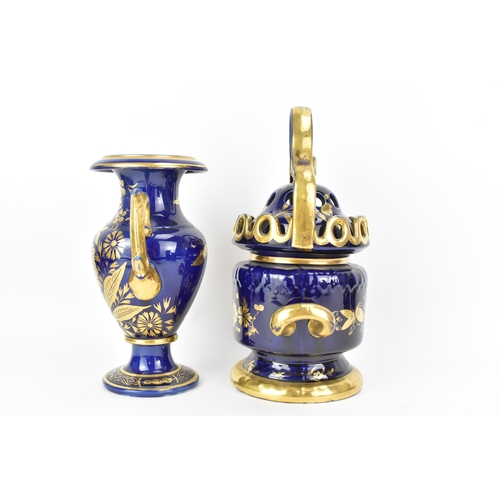 26 - An early 19th century Masons posy vase and twin handled vase, each with mazarine-blue ground, painte... 