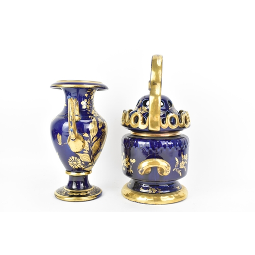 26 - An early 19th century Masons posy vase and twin handled vase, each with mazarine-blue ground, painte... 