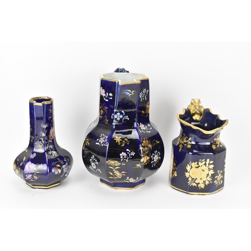 28 - Three early 19th century Masons jugs, with mazarine-blue ground, painted in an oriental style with f... 