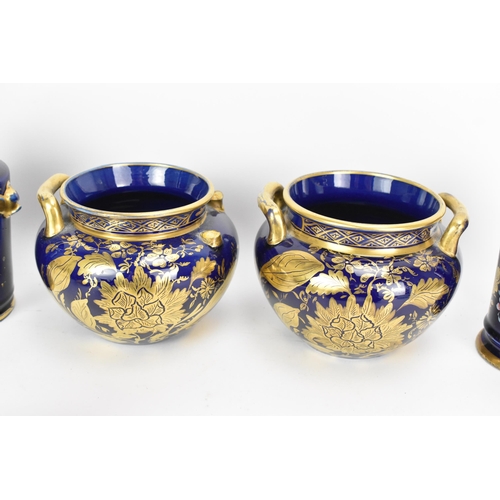 29 - A selection of early 19th century Masons ware, each with mazarine-blue ground, painted in an orienta... 