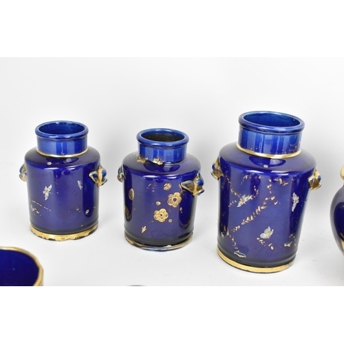 29 - A selection of early 19th century Masons ware, each with mazarine-blue ground, painted in an orienta... 