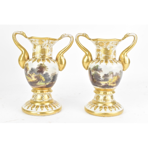 3 - An early 19th century Masons garniture of three ironstone vases, each with elaborate moulded handles... 