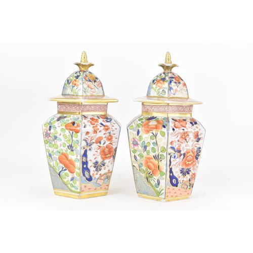 4 - A pair of early 19th century Masons ironstone hexagonal vases and covers, circa 1815-20, each hand-p... 