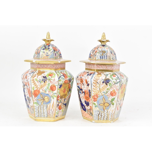 4 - A pair of early 19th century Masons ironstone hexagonal vases and covers, circa 1815-20, each hand-p... 