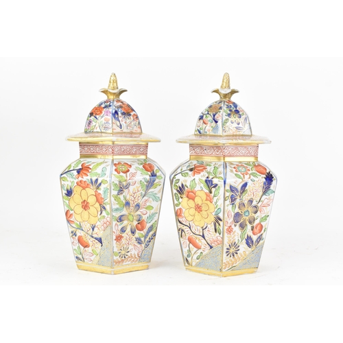 4 - A pair of early 19th century Masons ironstone hexagonal vases and covers, circa 1815-20, each hand-p... 