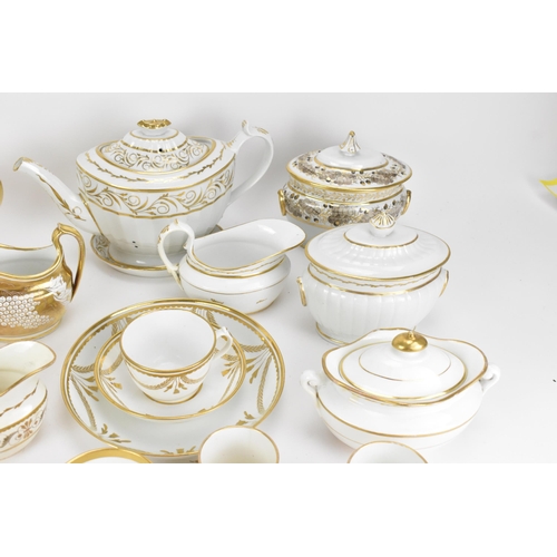 40 - A selection of early 19th century Masons ware, each on white glazed grounds decorated in gilt mainly... 