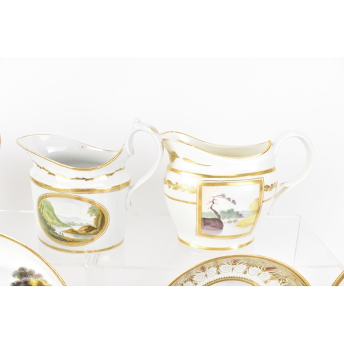 41 - A selection of early 19th century Masons ware, each on white glazed grounds, hand painted with lands... 