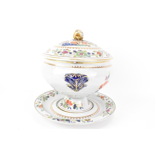 43 - An early 19th century Masons ironstone soup tureen, cover and stand, circa 1813-30, hand-painted wit... 