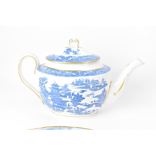 51 - Three early 19th century Masons blue and white teapots and stands, each transfer-printed with gilt h... 