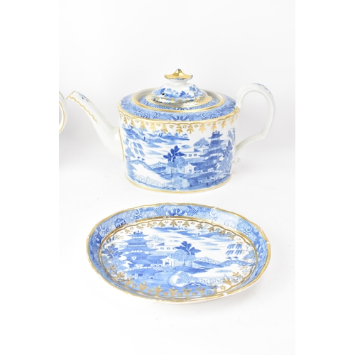 51 - Three early 19th century Masons blue and white teapots and stands, each transfer-printed with gilt h... 