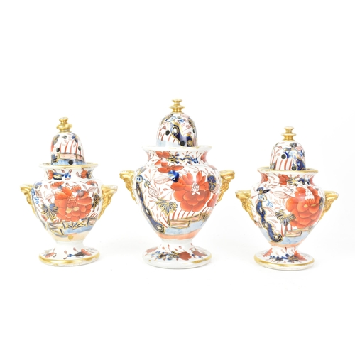 54 - Three early 19th century Masons potpourri vases, each painted in the 'Japan Fence' pattern, graduati... 