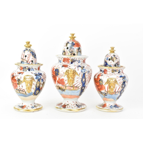 54 - Three early 19th century Masons potpourri vases, each painted in the 'Japan Fence' pattern, graduati... 