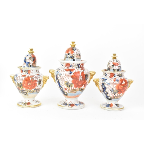 54 - Three early 19th century Masons potpourri vases, each painted in the 'Japan Fence' pattern, graduati... 