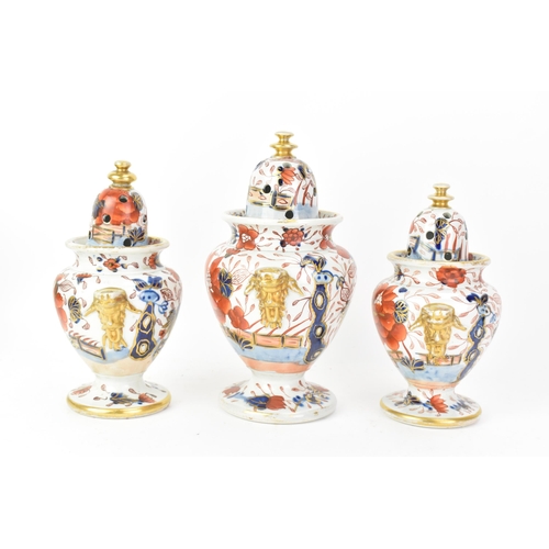 54 - Three early 19th century Masons potpourri vases, each painted in the 'Japan Fence' pattern, graduati... 