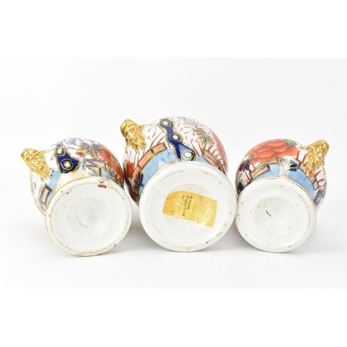 54 - Three early 19th century Masons potpourri vases, each painted in the 'Japan Fence' pattern, graduati... 