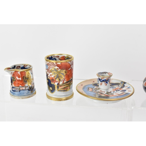 56 - A selection of 19th century Masons miniature items, each in the Japanese style to include vases, tan... 