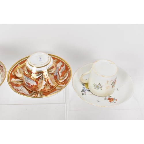 61 - A selection of eight 19th century Masons cups and saucers, to include one set in painted with a palm... 