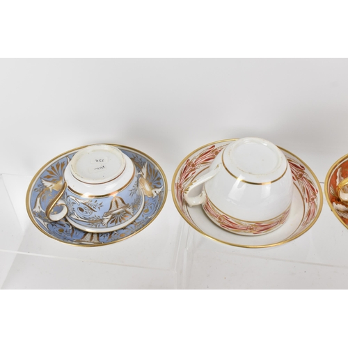 61 - A selection of eight 19th century Masons cups and saucers, to include one set in painted with a palm... 