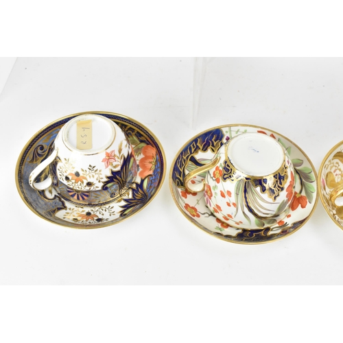 62 - A selection of eight 19th century Masons cups and saucers, to include a bone china set hand-painted,... 