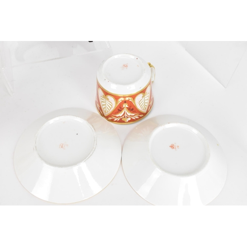 95 - A selection of early 19th century Derby porcelain to include a circa 1820 tea cup and saucer with a ... 